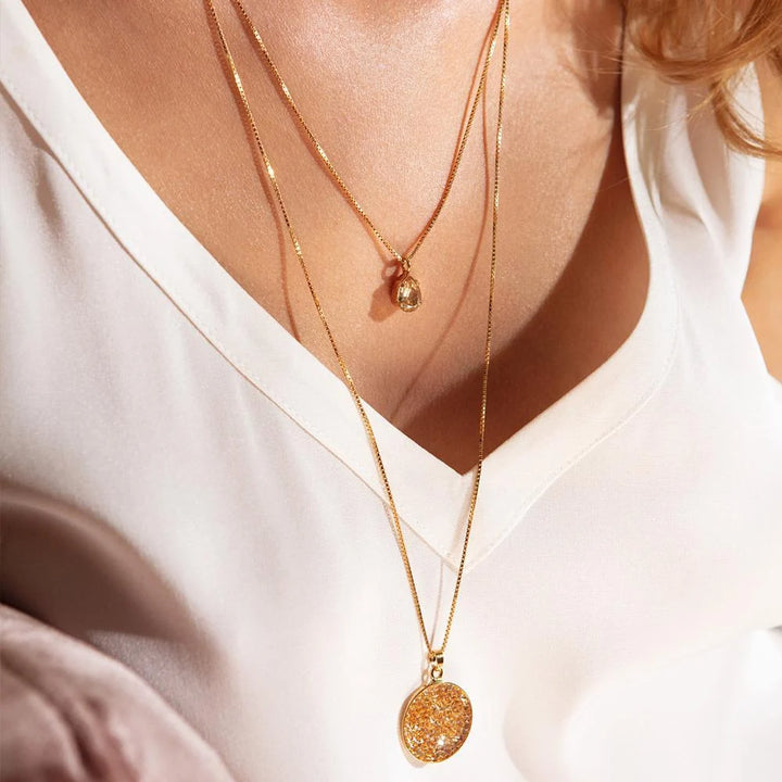 Petite drop necklace golden shadow